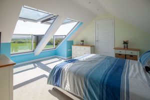 6 Hillside_Bedroom One- click for photo gallery